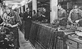 jewish_slave_labourers_in_a_nazi_ammunition_factory_near_dachau_concentration_camp.jpg
